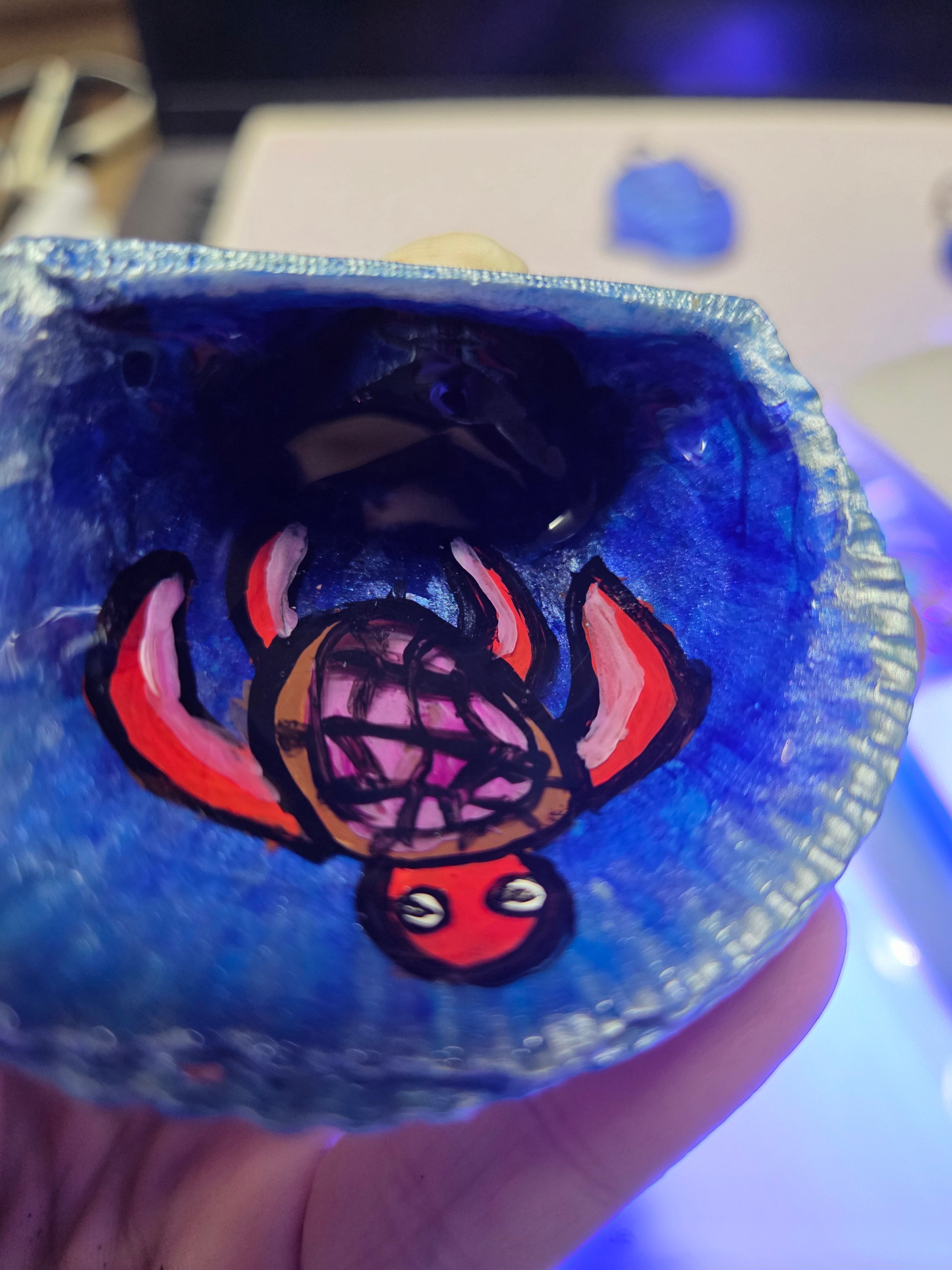 Sea turtle on a sea shell